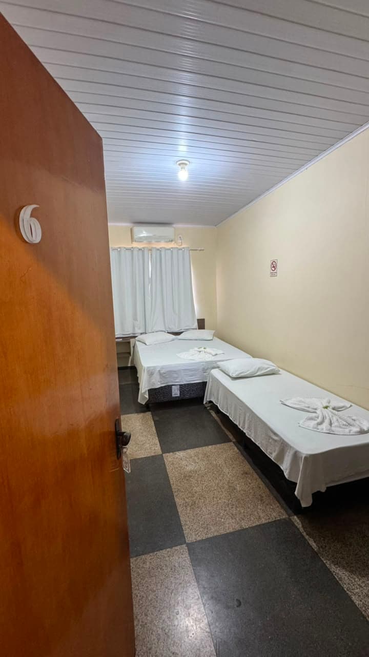 Quarto individual padrão do Hotel APM1