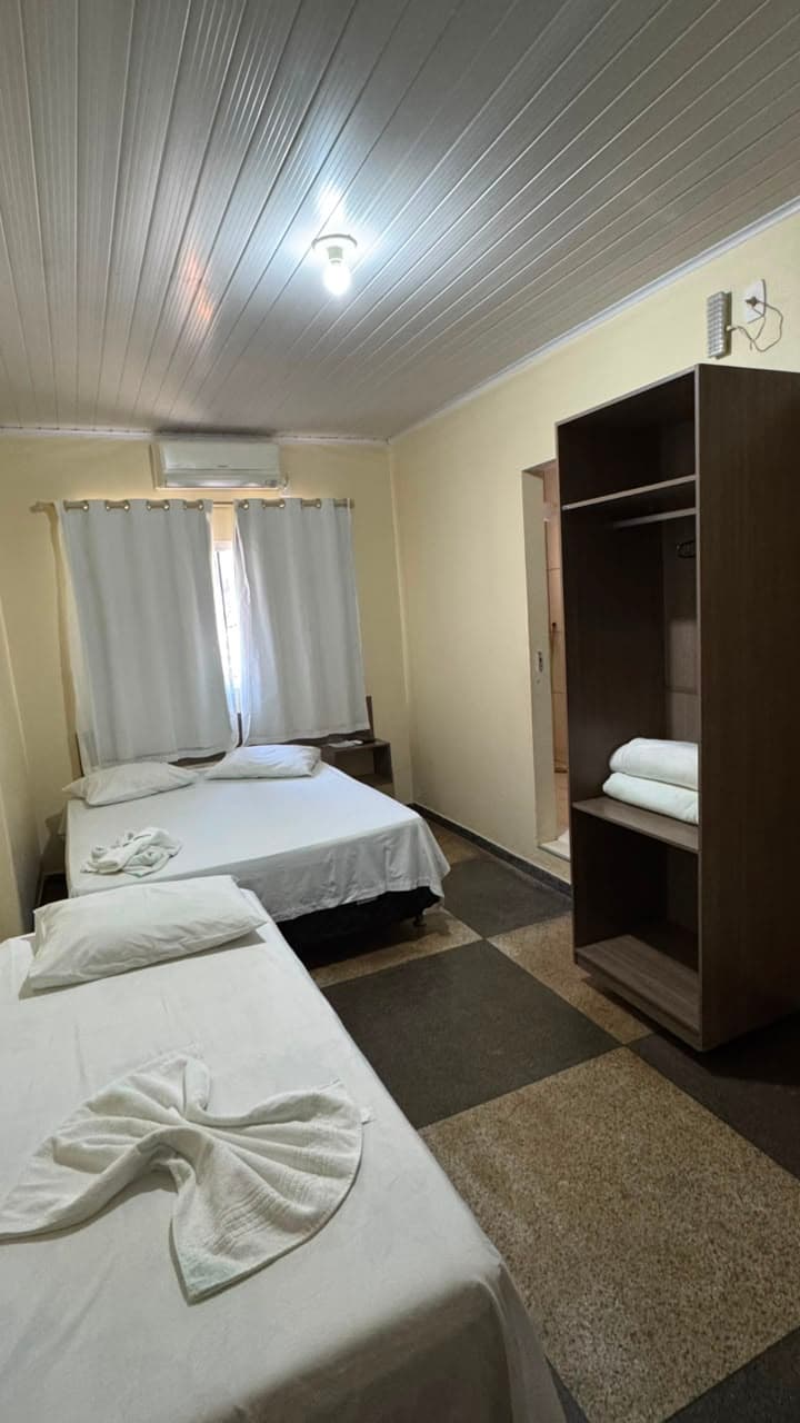 Quarto individual padrão do Hotel APM1